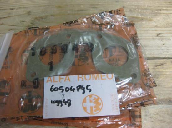 60504795 Afstandstuk carburateur