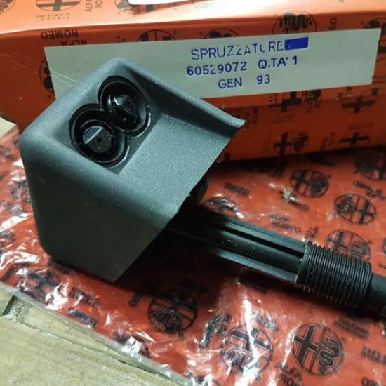 60529072 Koplampsproeier rechts