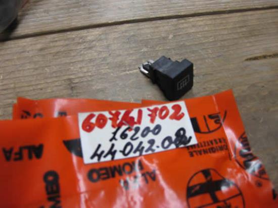 60741702 Schakelaar achterruit verwarming Alfa Romeo 90