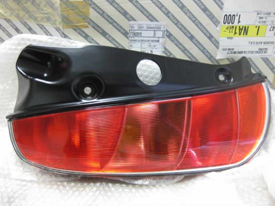 77362815 Glas achterlicht links