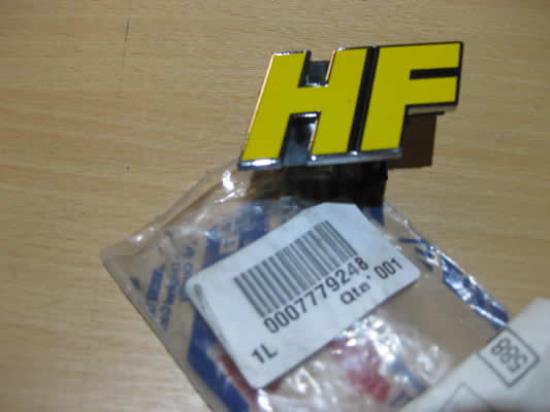 7779248 Logo HF voor grille voorzijde