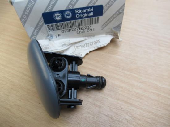 735276222 Koplampsproeier links