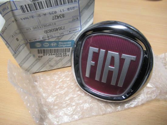 735450639 Achterklep slot drukknop met embleem