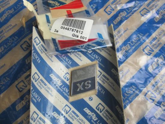 46757612 Embleem SX achterkant