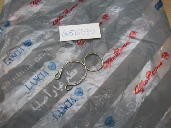 60516430 Bobinekapklem