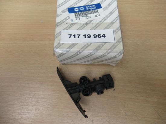 71719964 Koplampsproeier links