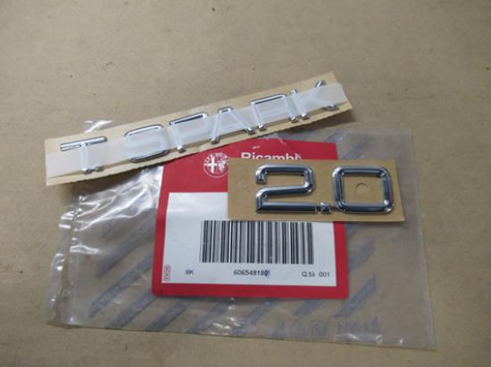 60654818 Embleem 2.0 T. SPARK