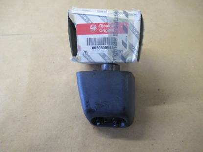 60599944 Koplampsproeier rechterzijde