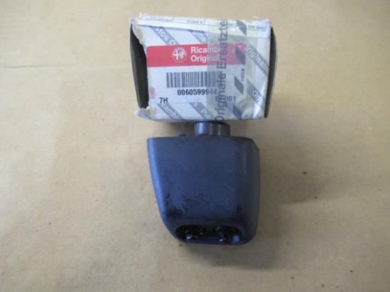 60599944 Koplampsproeier rechterzijde