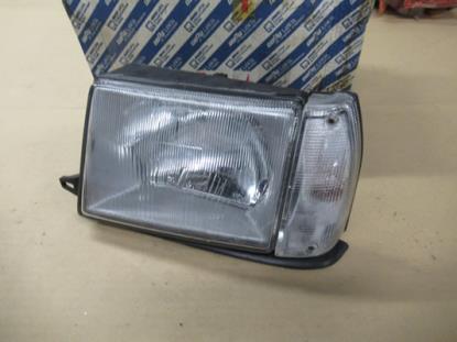 7737588 Xenon koplamp linkerzijde Carello