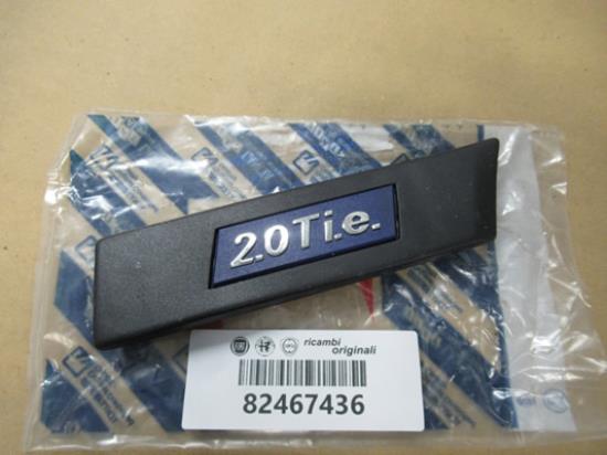 82467436 Stootrubber met embleem 2.0 T i.e. rechtsvoor